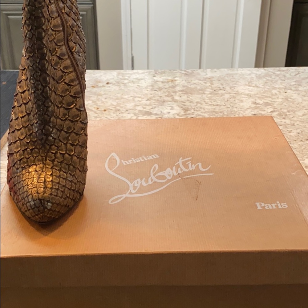 Christian Louboutin python bronze color.